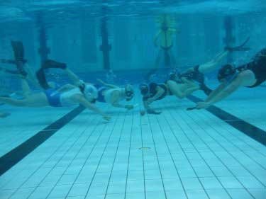 Playing Underwater Hockey