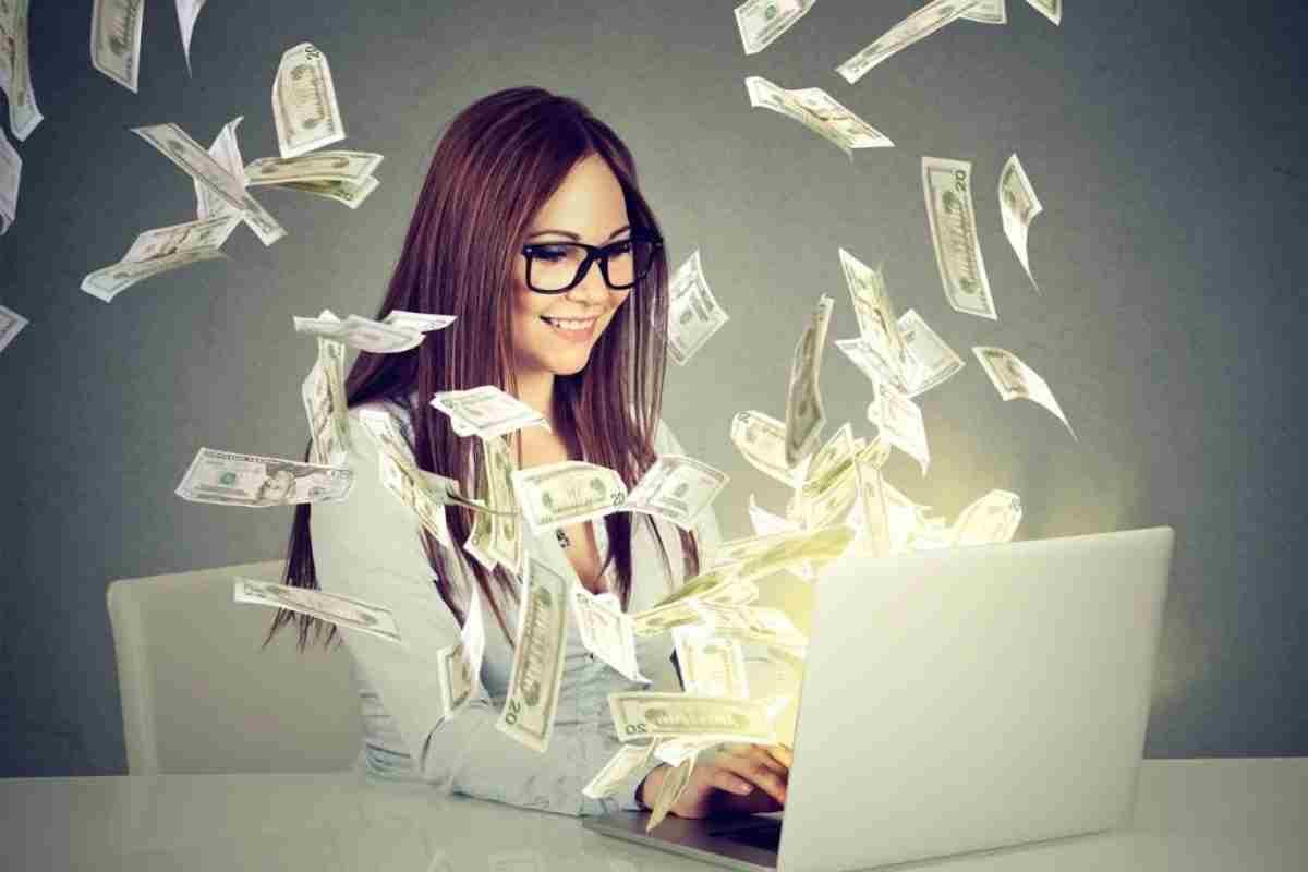 Girl working on laptop and making money