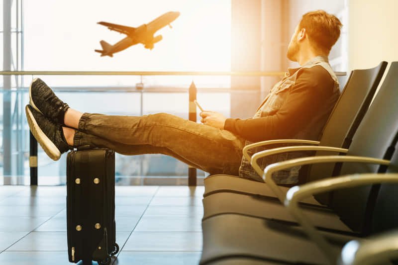 A person waiting for his flight on airport